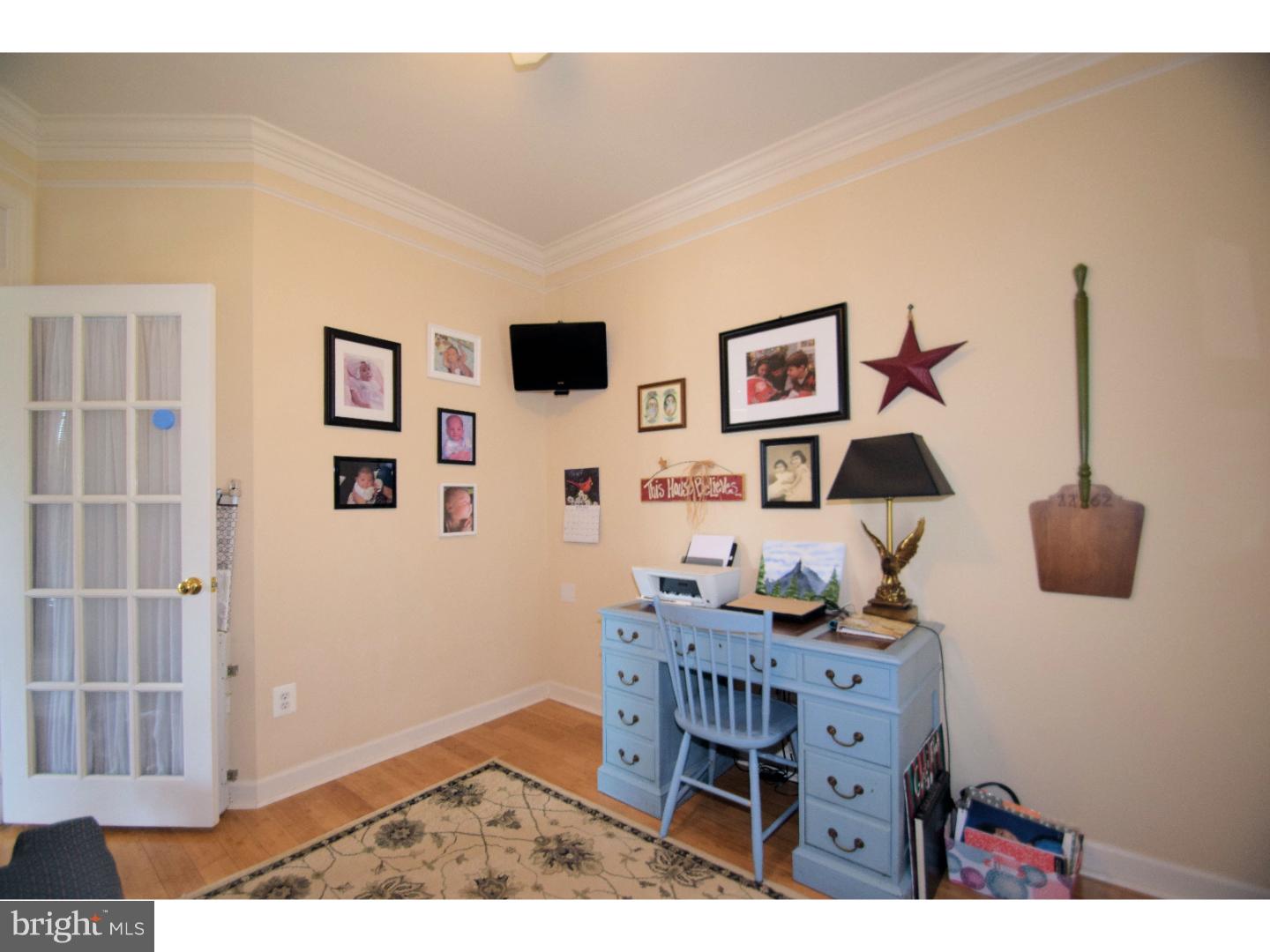 205 Barnhill Road Perkasie, PA 18944 - Photo 6 of 25 a living room with furniture and wall paintings