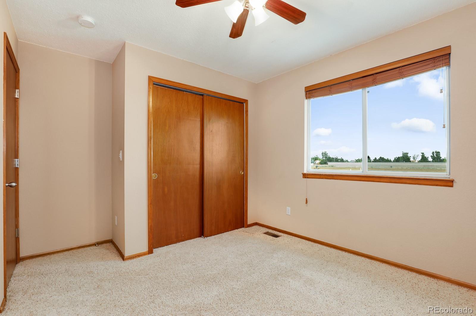 1055 Cobblestone Drive Highlands Ranch, CO 80126 - Photo 19 of 31 an empty room with window