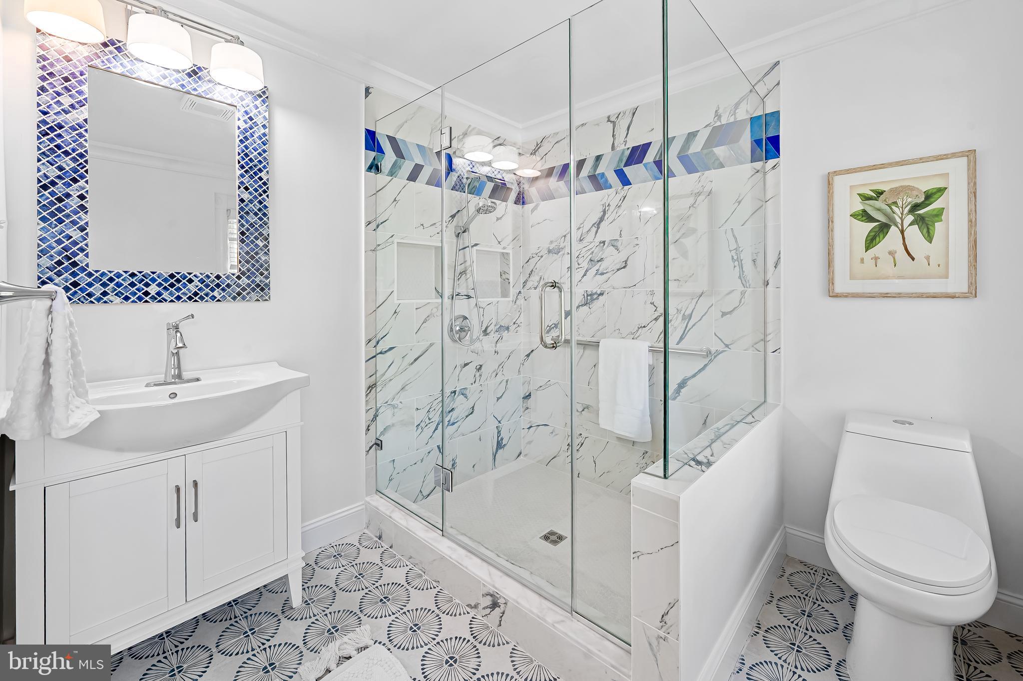 748 Ramsay Street Baltimore, MD 21230 - Photo 25 of 36 a bathroom with a sink toilet and shower