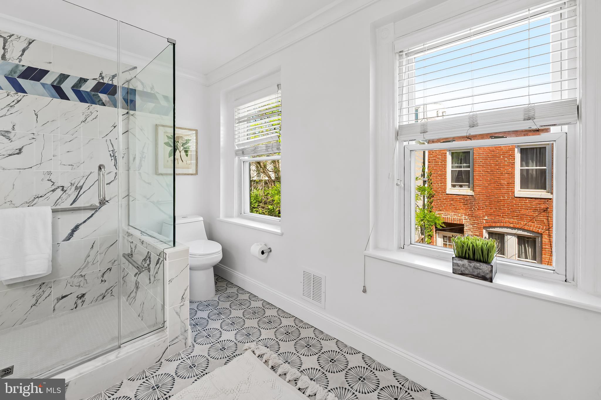748 Ramsay Street Baltimore, MD 21230 - Photo 26 of 36 a bathroom with a bathtub and shower