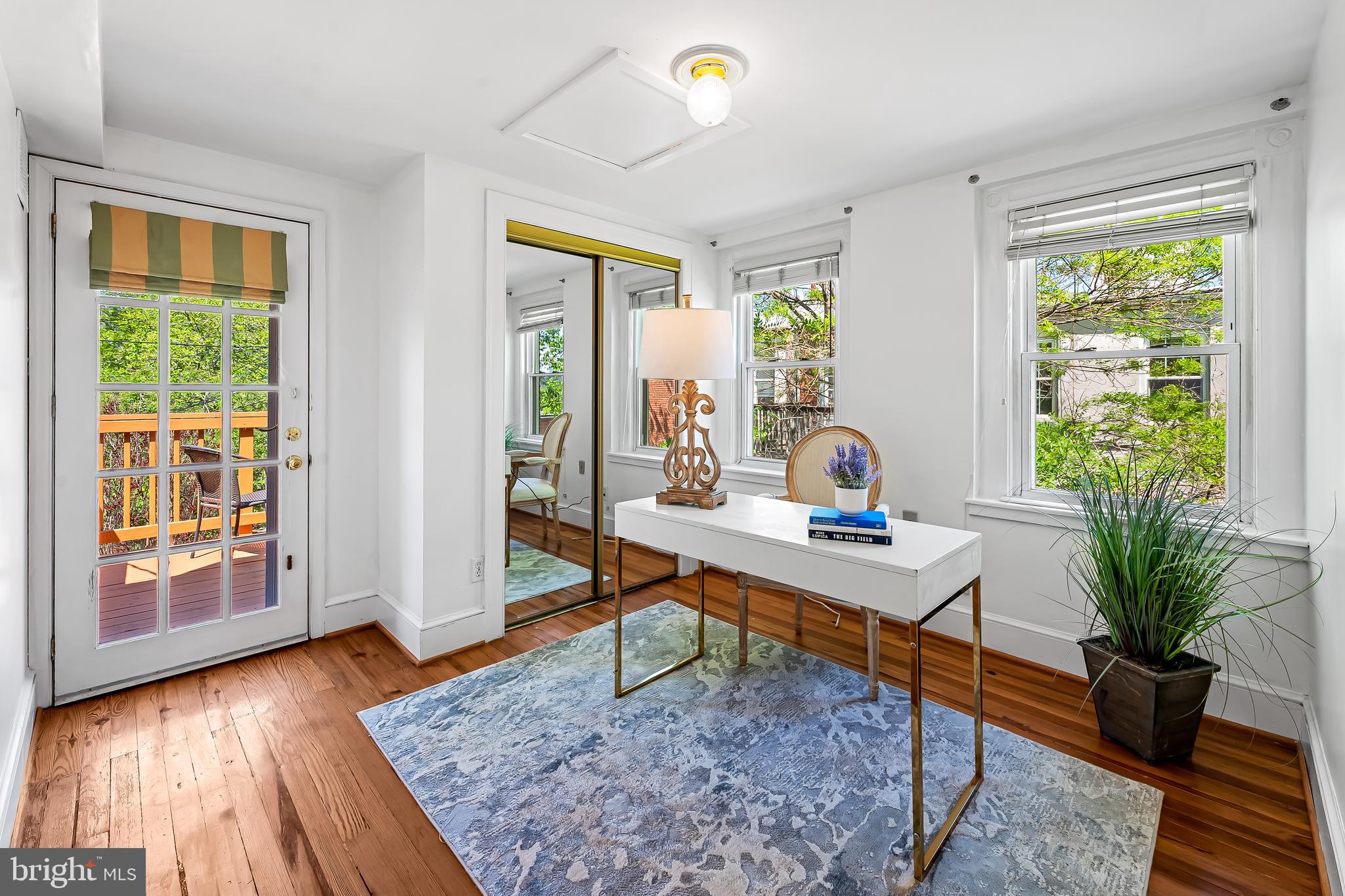 748 Ramsay Street Baltimore, MD 21230 - Photo 27 of 36 a view of a workspace with furniture and a window