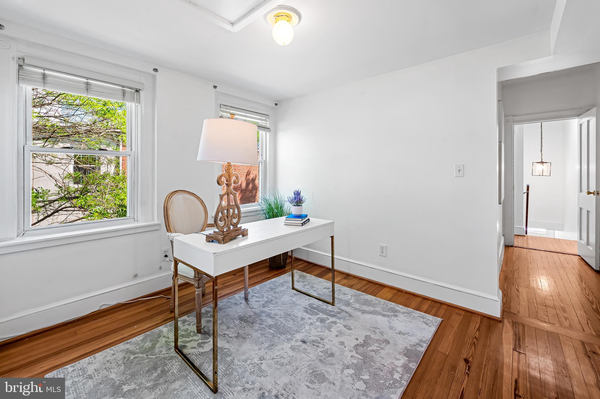 748 Ramsay Street Baltimore, MD 21230 - Photo 28 of 36 a room with a table and a window