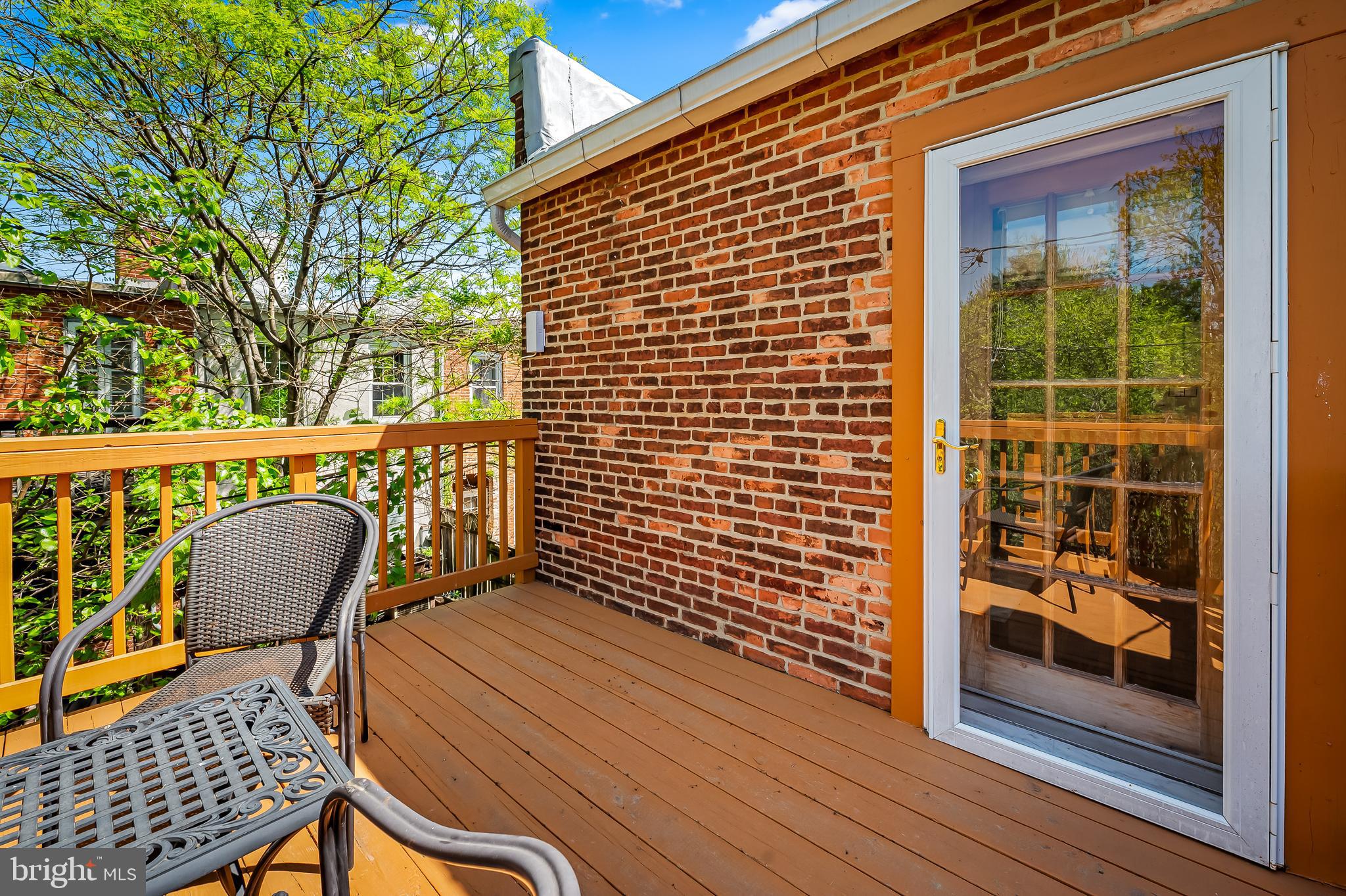 748 Ramsay Street Baltimore, MD 21230 - Photo 29 of 36 a outdoor living space with wooden floor and furniture