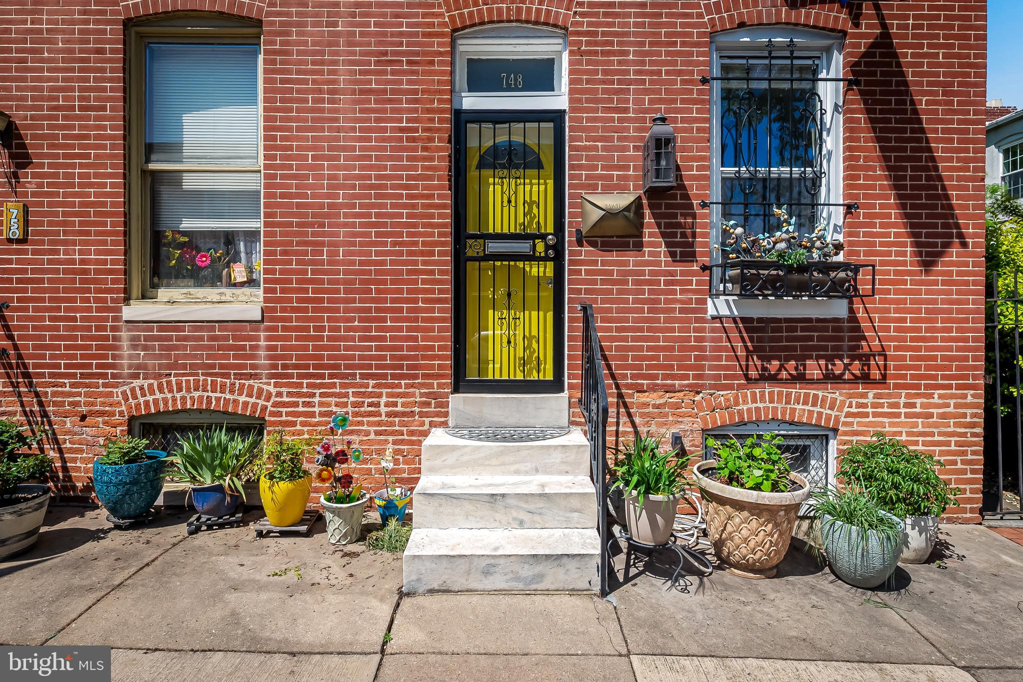 748 Ramsay Street Baltimore, MD 21230 - Photo 3 of 36 a front view of a house