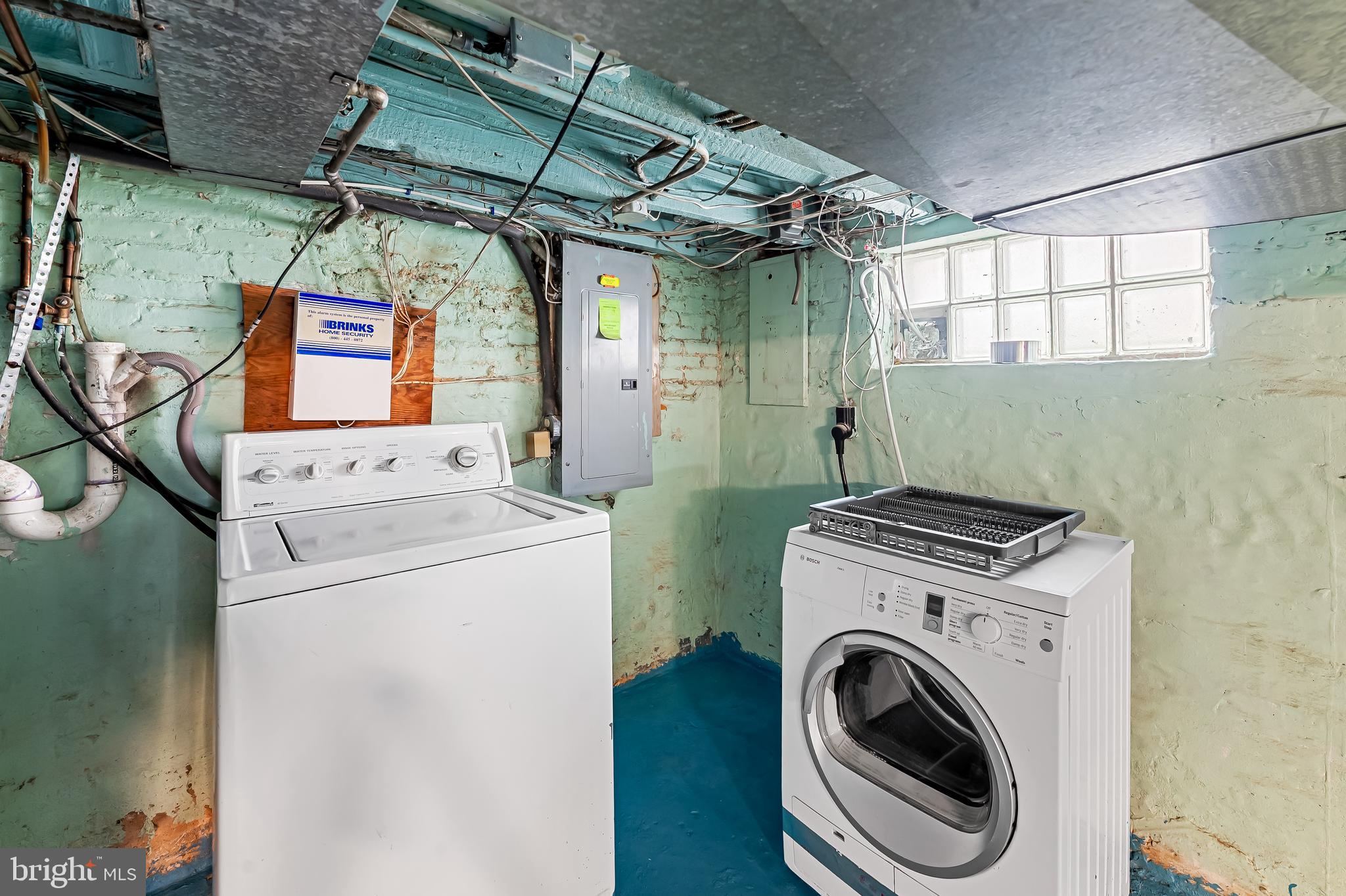748 Ramsay Street Baltimore, MD 21230 - Photo 32 of 36 a utility room with dryer and washer