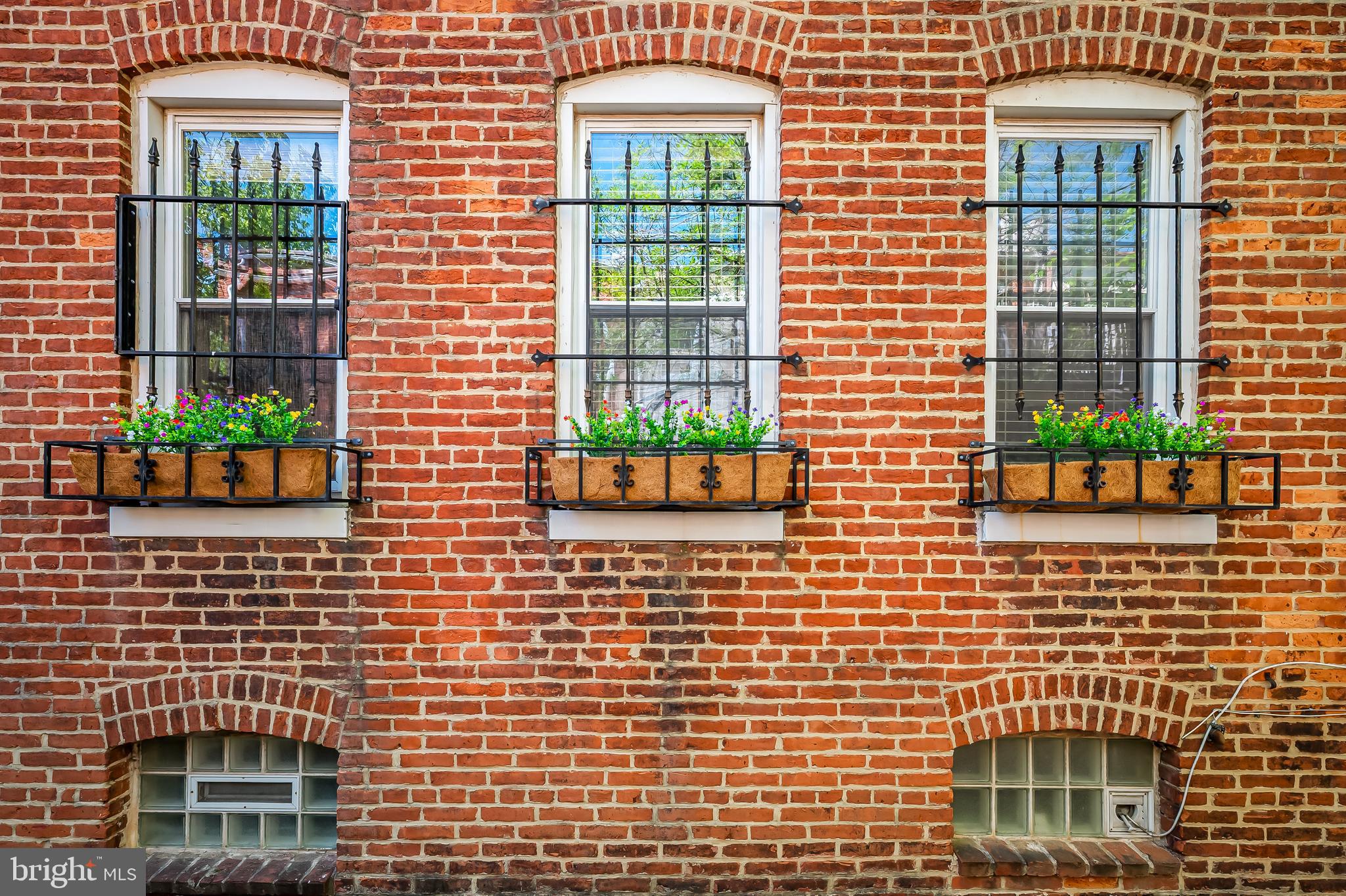 748 Ramsay Street Baltimore, MD 21230 - Photo 36 of 36 a front view of a brick house with large windows
