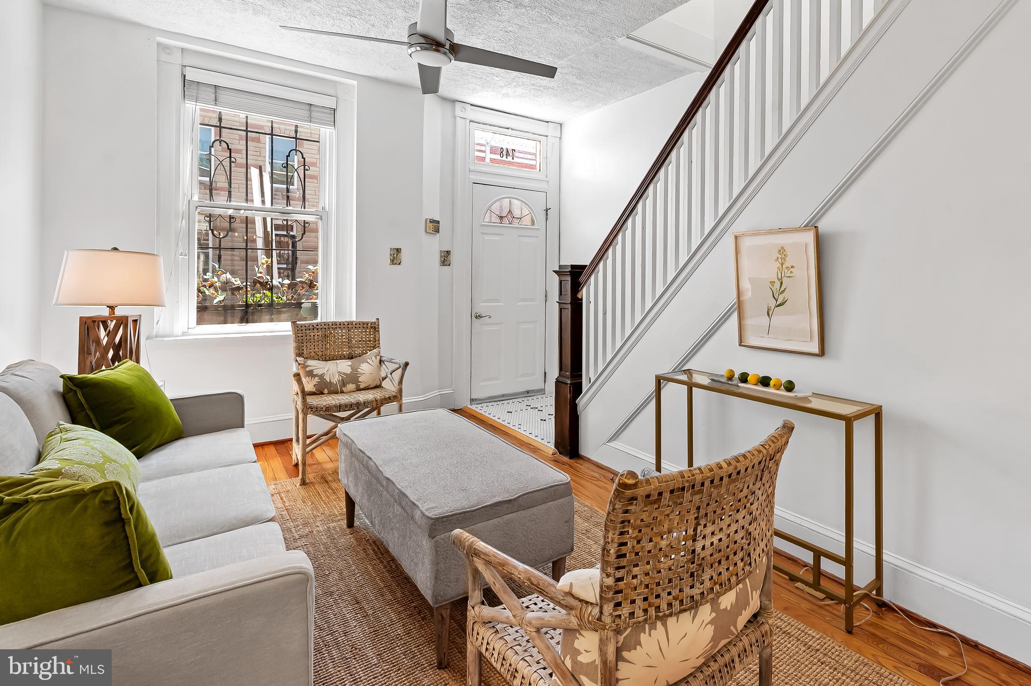 748 Ramsay Street Baltimore, MD 21230 - Photo 8 of 36 a living room with furniture and a window