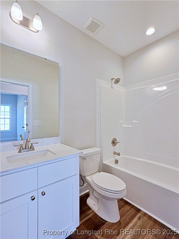 1554 Piney Grove Road Lumberton, NC 28360 - Photo 20 of 27 a bathroom with a sink a toilet and a mirror
