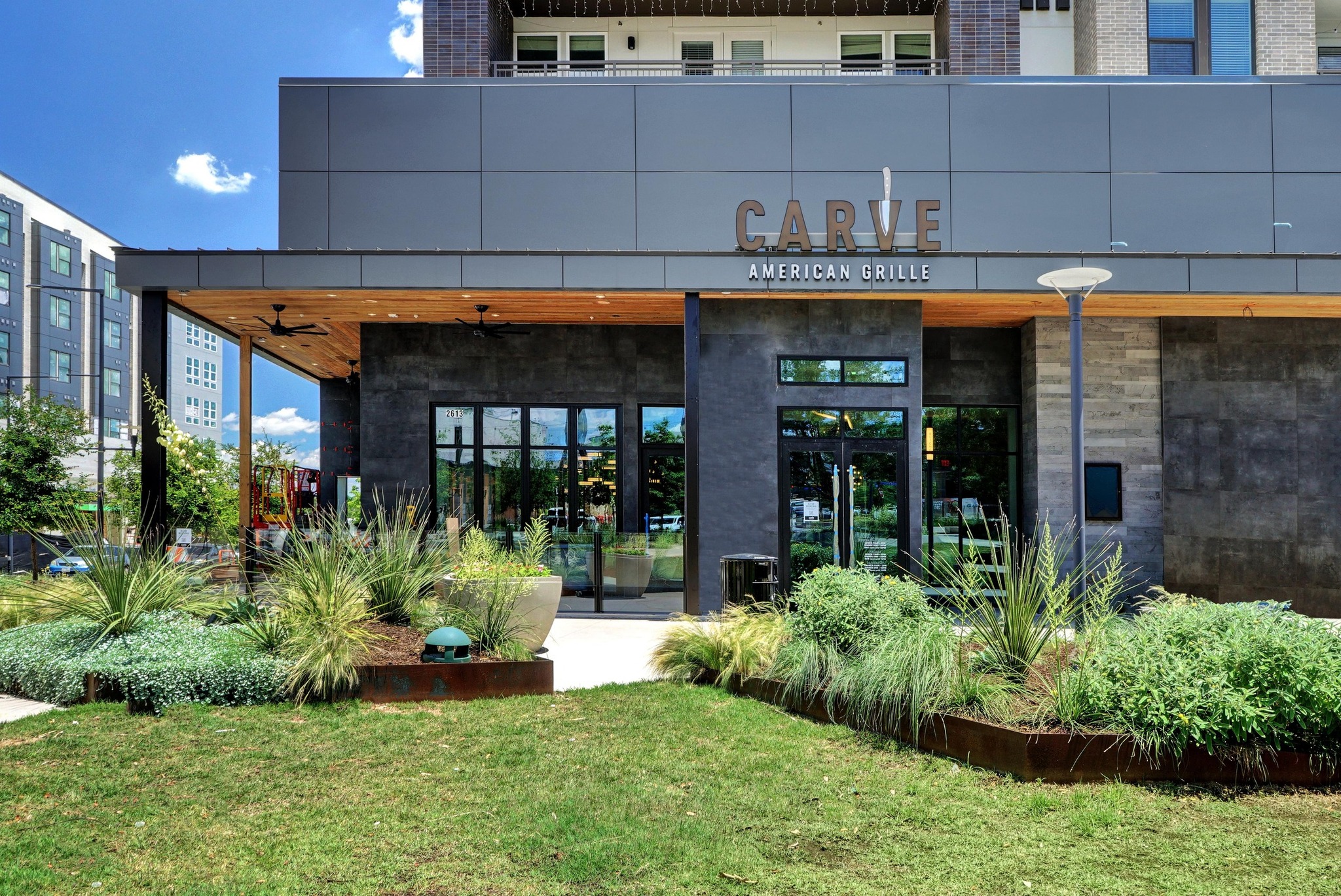 4501 Jackson Avenue, Unit 5302 Austin, TX 78731 - Photo 28 of 38 a view of a building with potted plants