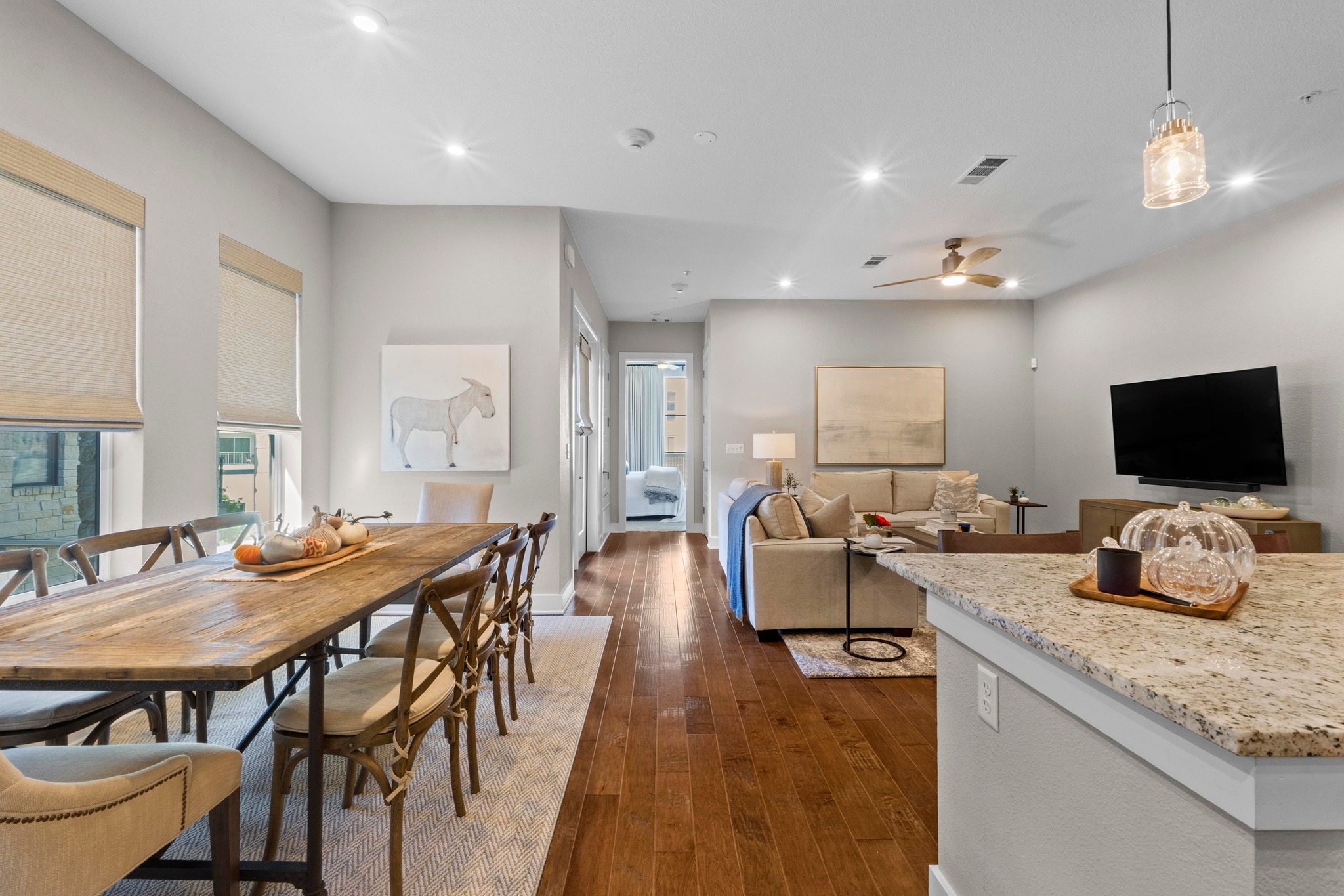 4501 Jackson Avenue, Unit 5302 Austin, TX 78731 - Photo 3 of 38 a large kitchen with a table and chairs