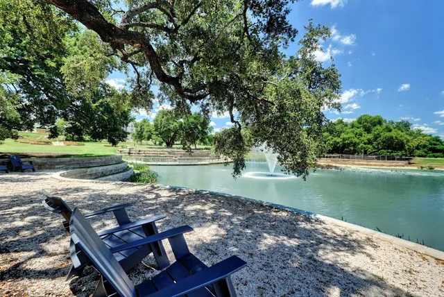 a view of a lake with a big yard