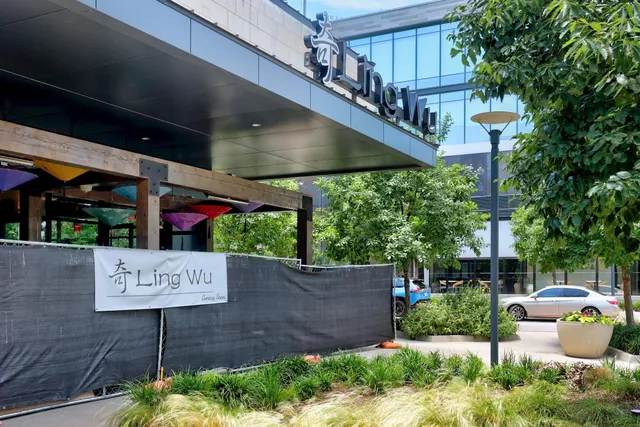 a view of street with sitting area