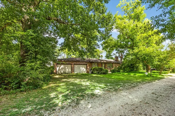 a house view with a garden space