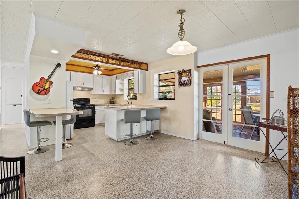 148 Roberts Road Nokomis, FL 34275 - Photo 23 of 68 a view of kitchen with furniture and windows