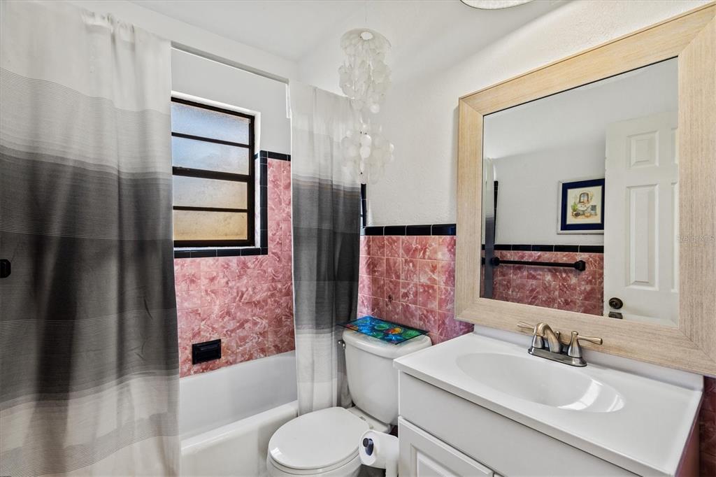 148 Roberts Road Nokomis, FL 34275 - Photo 26 of 68 a bathroom with a sink toilet and shower