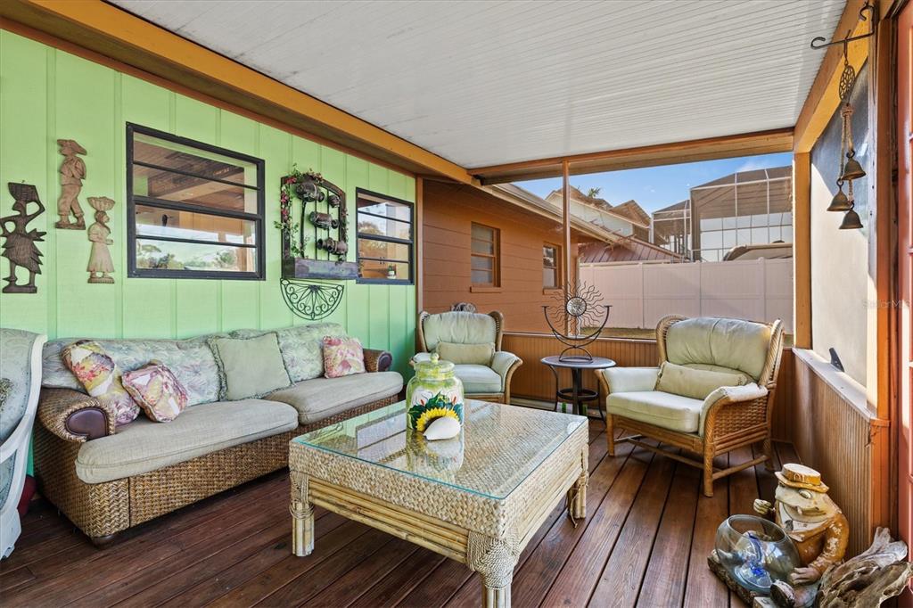 148 Roberts Road Nokomis, FL 34275 - Photo 32 of 68 a living room with furniture and a large window