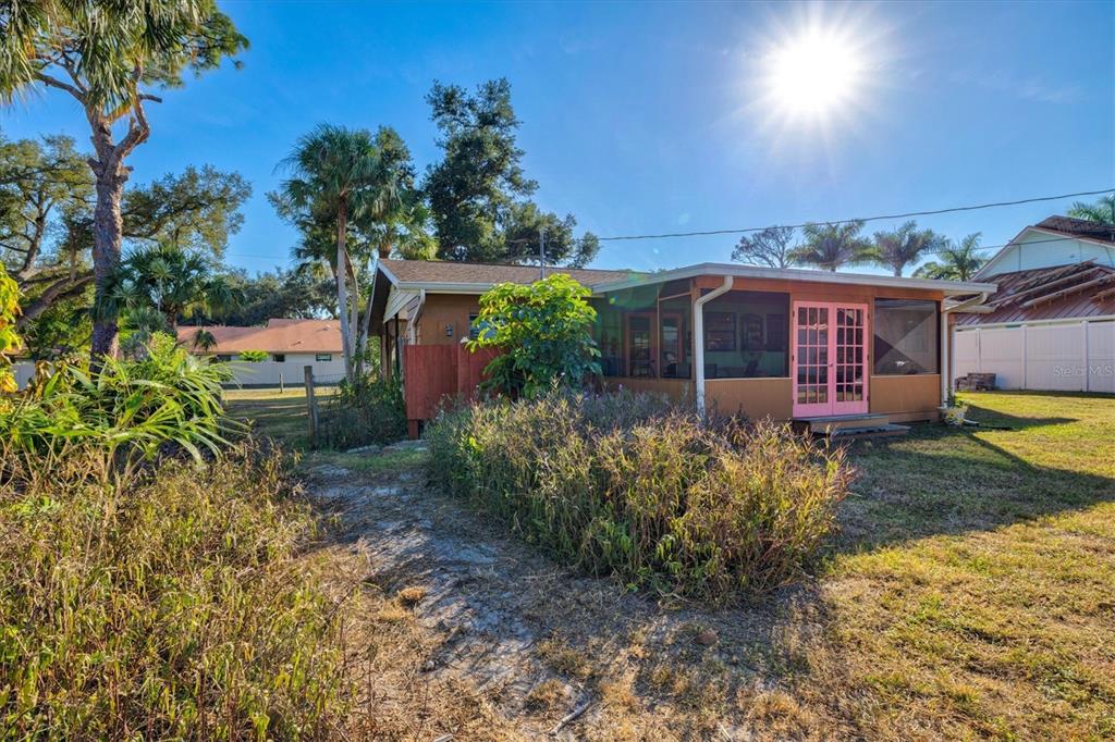 148 Roberts Road Nokomis, FL 34275 - Photo 37 of 68 front view of a house with a yard