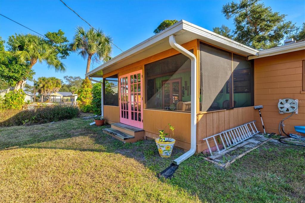 148 Roberts Road Nokomis, FL 34275 - Photo 51 of 68 a view of house with a yard