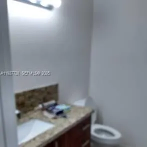 a view of small space with wooden floor