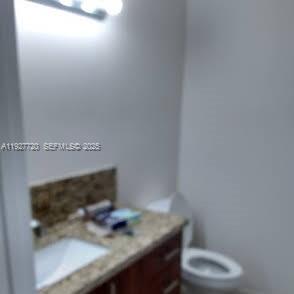 2493 Centergate Drive, Unit 102 Miramar, FL 33025 - Photo 9 of 10 a view of small space with wooden floor