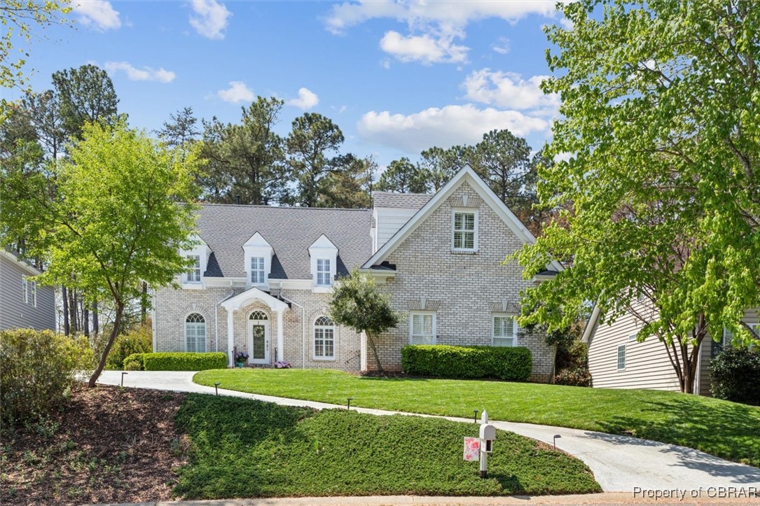 3013 Ridge Drive Toano, VA 23168 - Photo 1 of 50 Cape cod home featuring a front lawn and brick siding