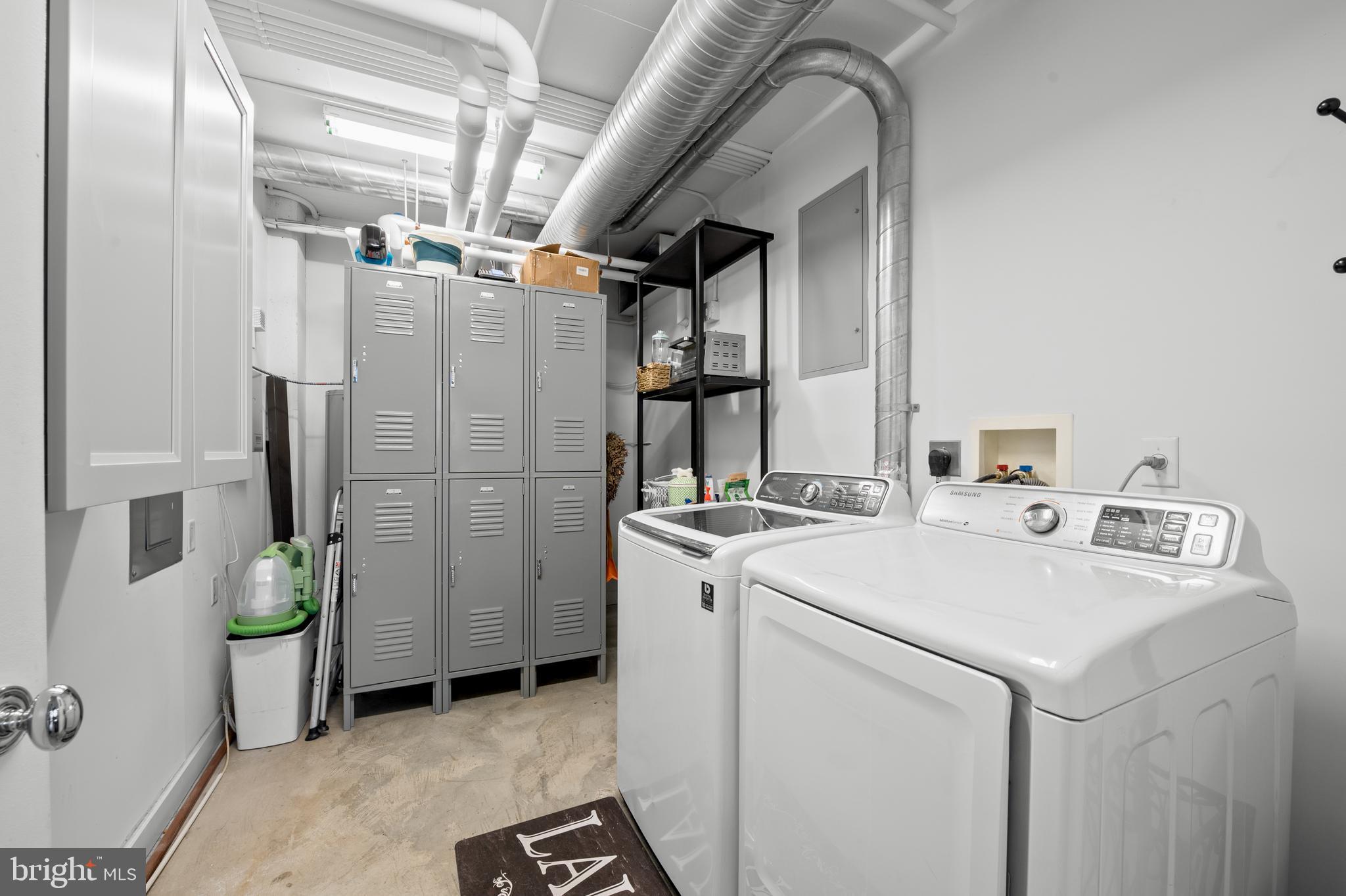 1220 Bank Street, Unit 309 Baltimore, MD 21202 - Photo 40 of 56 a utility room with dryer and washer
