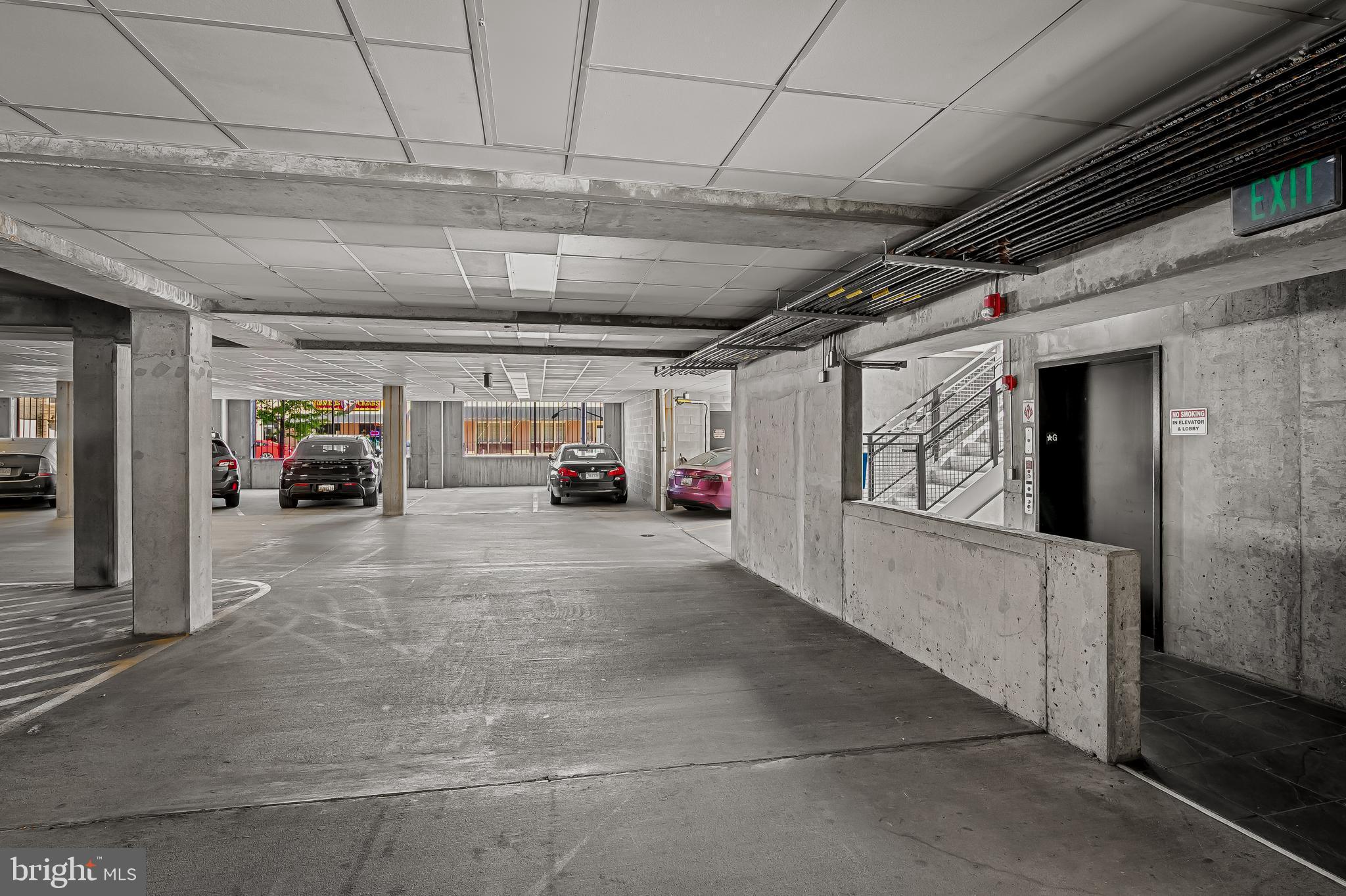 1220 Bank Street, Unit 309 Baltimore, MD 21202 - Photo 50 of 56 a view of parking garage with cars