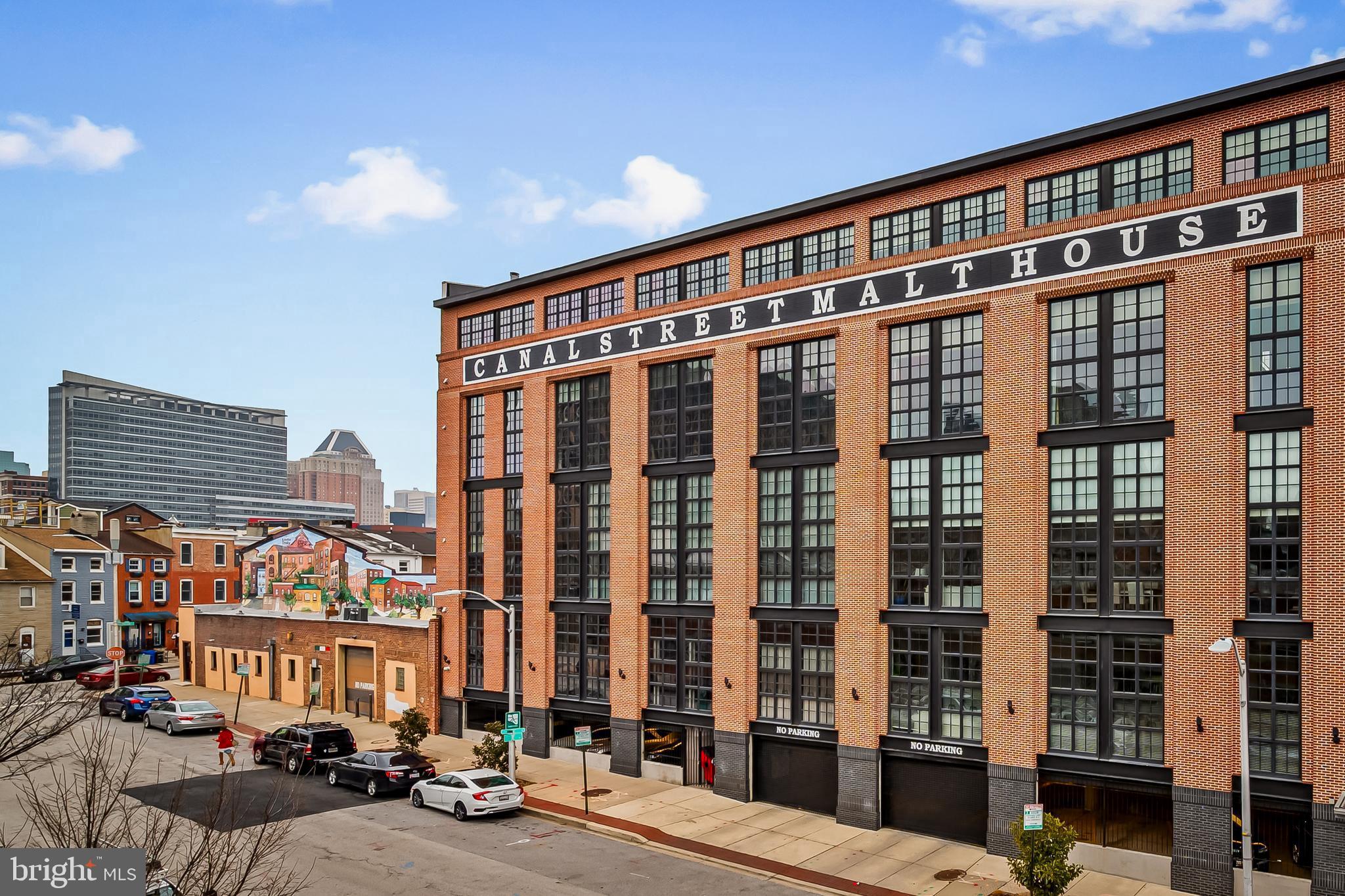 1220 Bank Street, Unit 309 Baltimore, MD 21202 - Photo 53 of 56 a front view of a building with a street