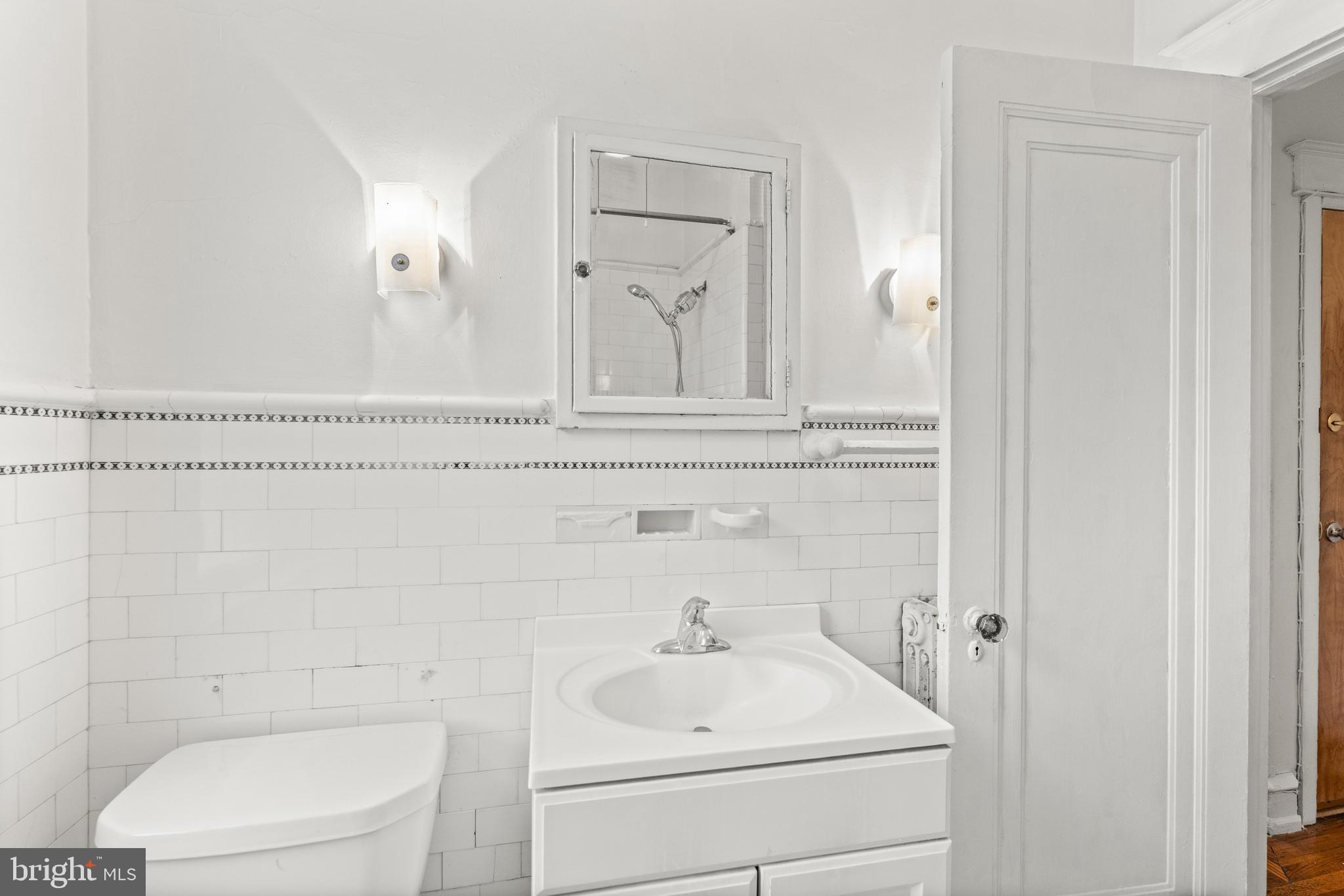 409 Pine Street, Unit 3 Philadelphia, PA 19106 - Photo 22 of 30 a bathroom with a sink a toilet and shower