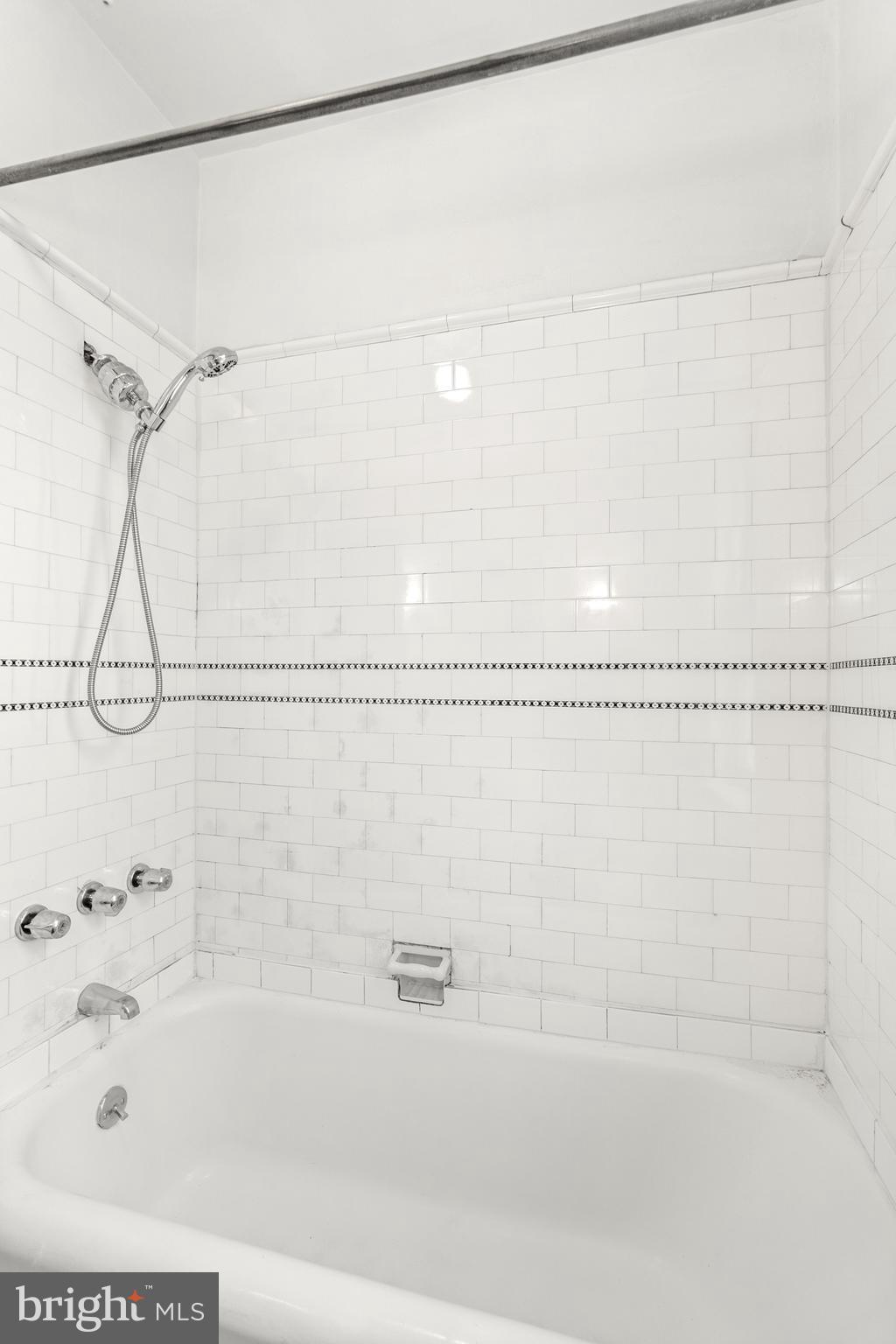 409 Pine Street, Unit 3 Philadelphia, PA 19106 - Photo 23 of 30 a bathroom with a bathtub and a shower