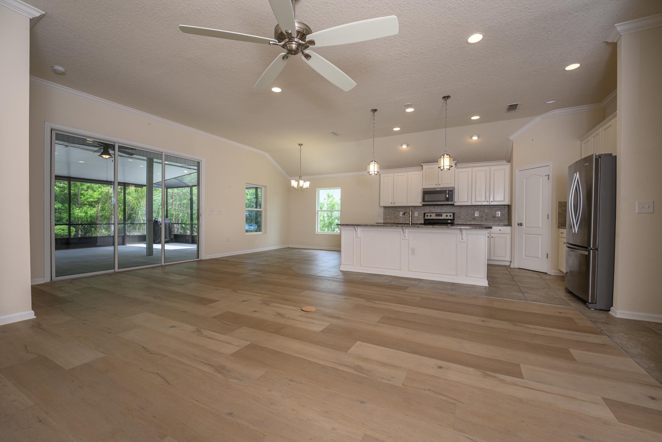 772 Pullman Circle St. Augustine, FL 32084 - Photo 17 of 77 a view of large kitchen with a sink and a stove top oven