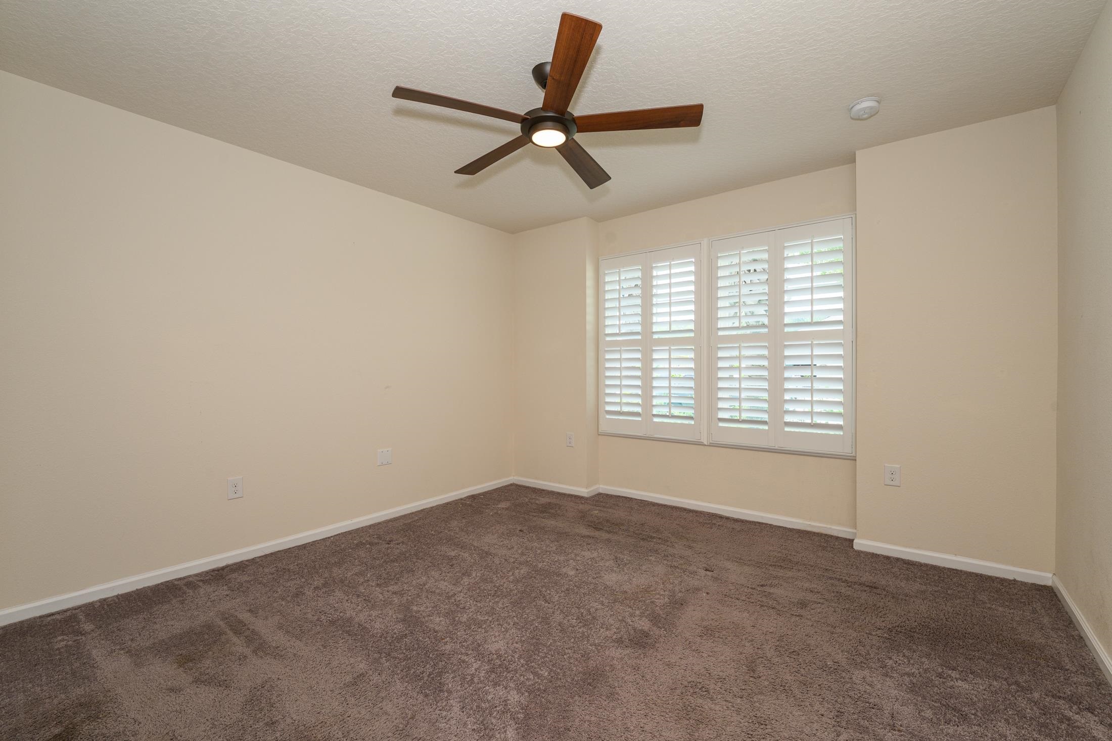 772 Pullman Circle St. Augustine, FL 32084 - Photo 26 of 77 a view of a livingroom with a ceiling fan and window