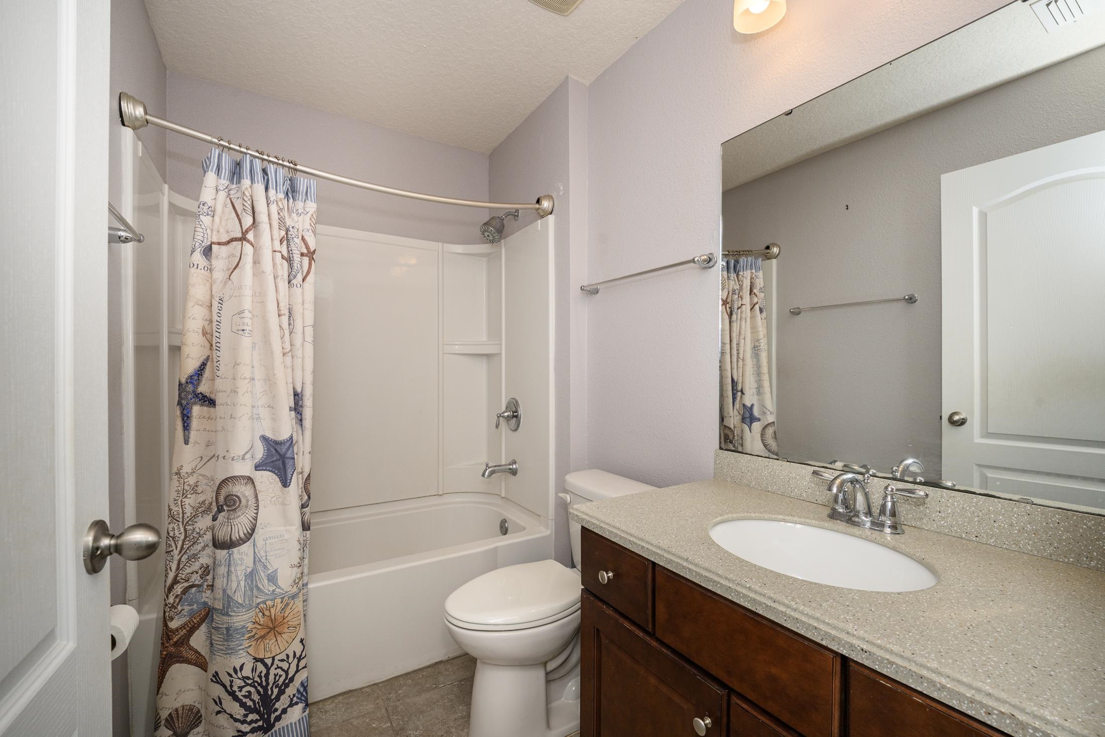 772 Pullman Circle St. Augustine, FL 32084 - Photo 30 of 77 a bathroom with a sink toilet tub and shower