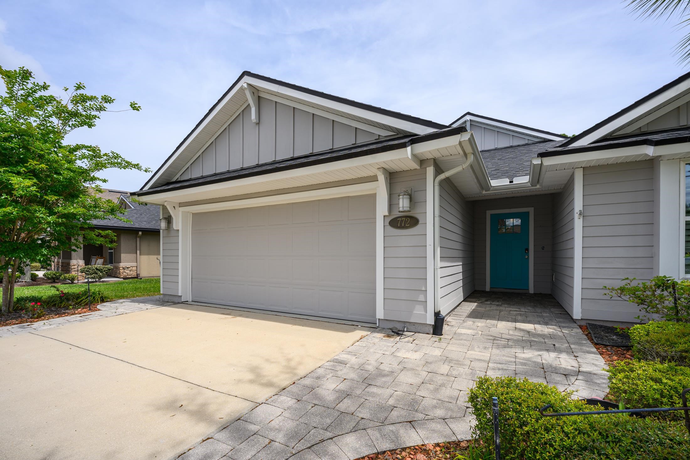 772 Pullman Circle St. Augustine, FL 32084 - Photo 3 of 77 a front view of a house with a yard and garage