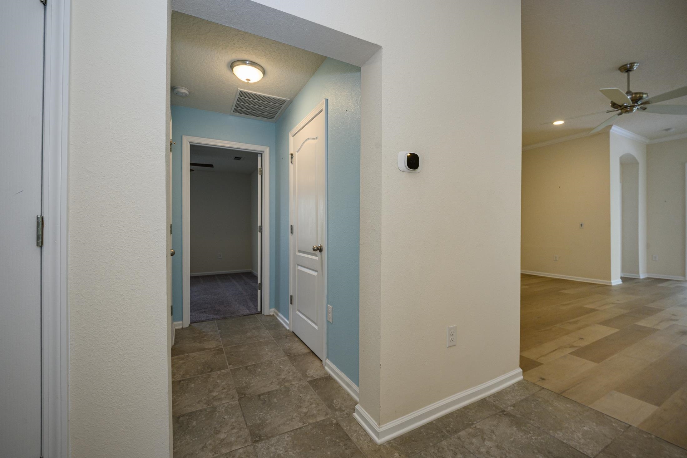 772 Pullman Circle St. Augustine, FL 32084 - Photo 37 of 77 a view of a hallway with a room and a bathroom