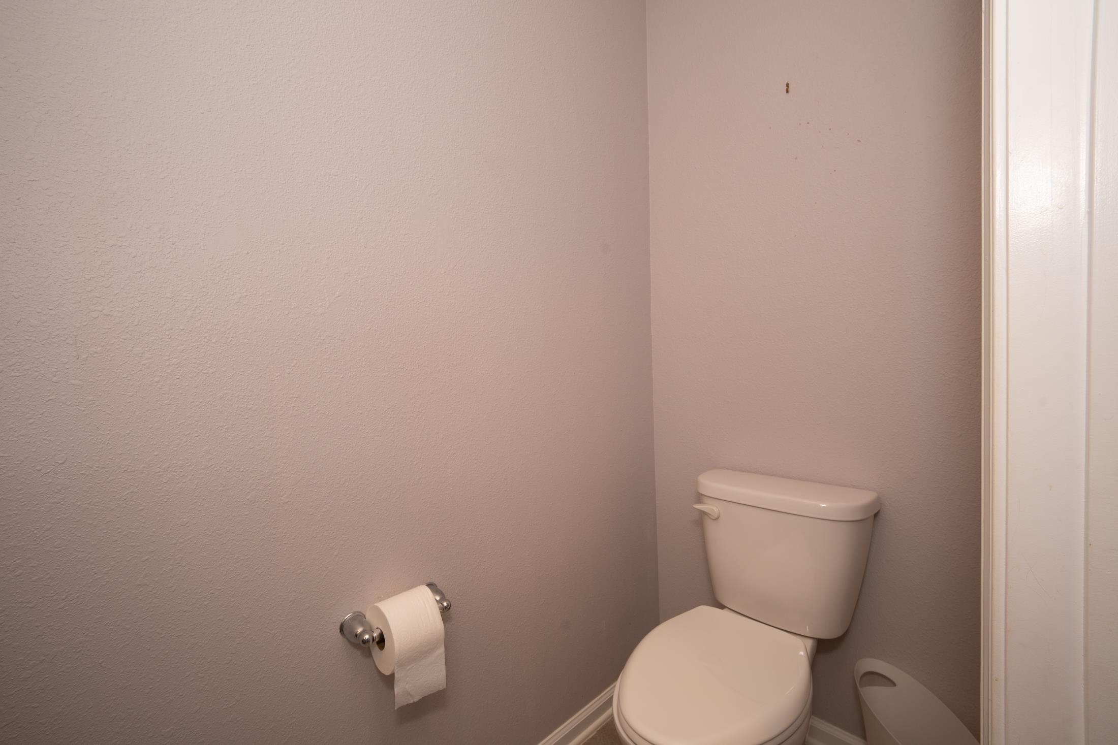772 Pullman Circle St. Augustine, FL 32084 - Photo 41 of 77 a white toilet sitting next to a white wall
