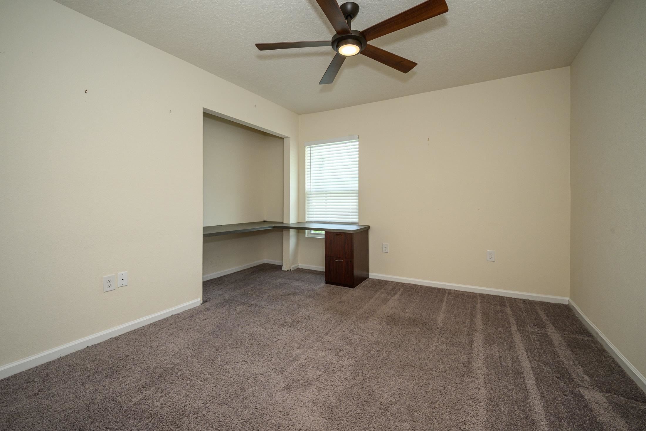 772 Pullman Circle St. Augustine, FL 32084 - Photo 42 of 77 an empty room with a empty space and windows