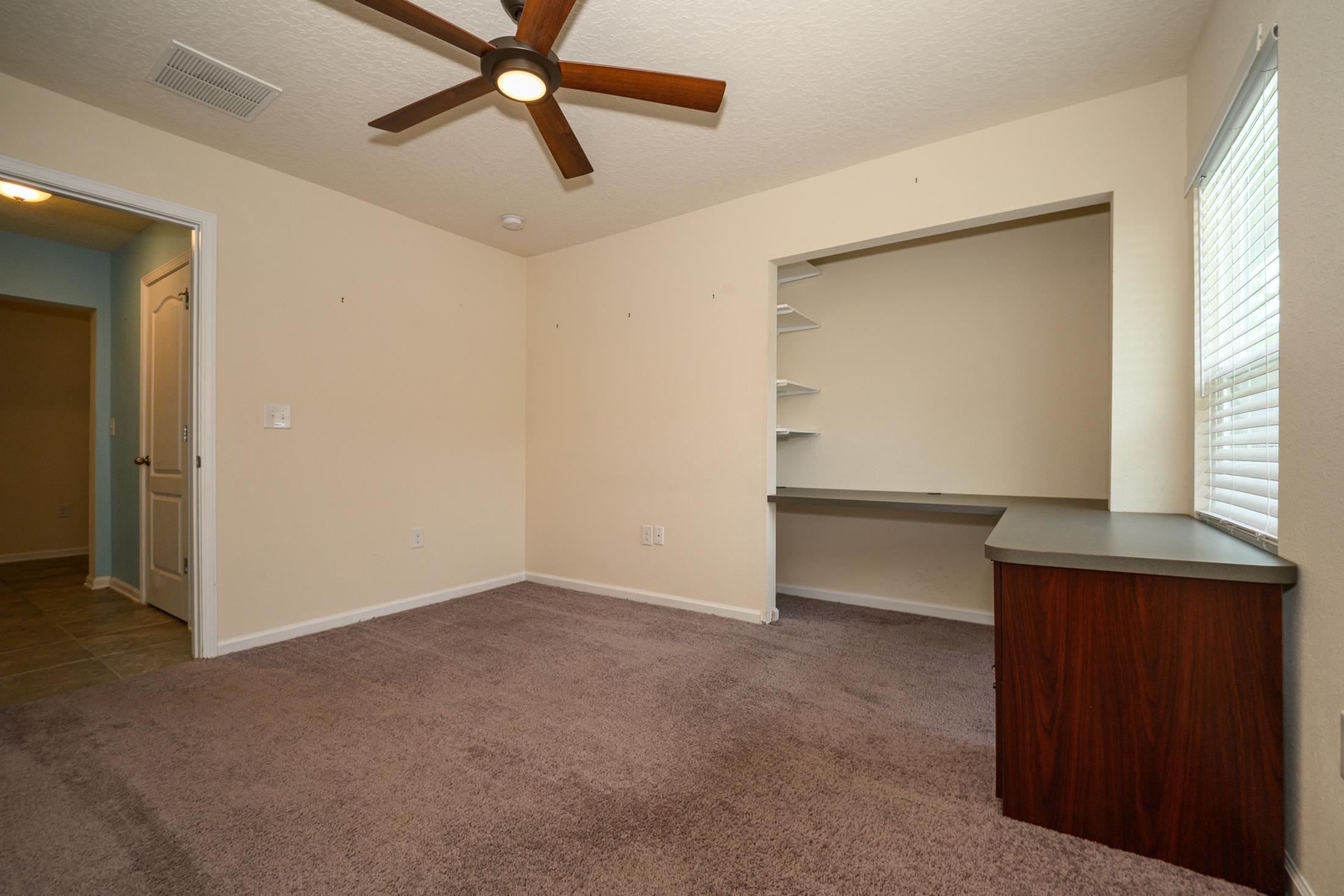 772 Pullman Circle St. Augustine, FL 32084 - Photo 43 of 77 a view of an empty room with a window