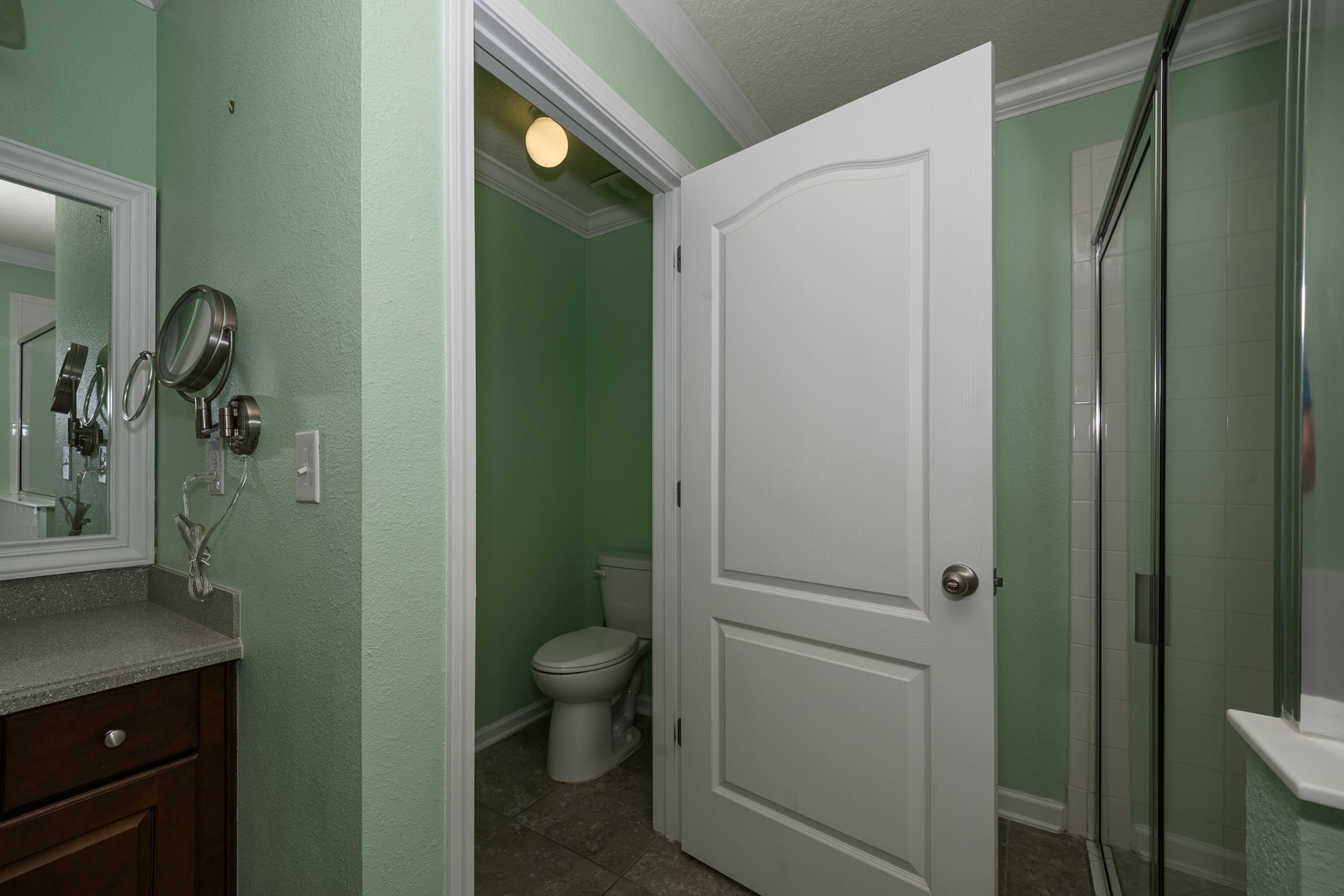 772 Pullman Circle St. Augustine, FL 32084 - Photo 55 of 77 a bathroom with a shower and a toilet