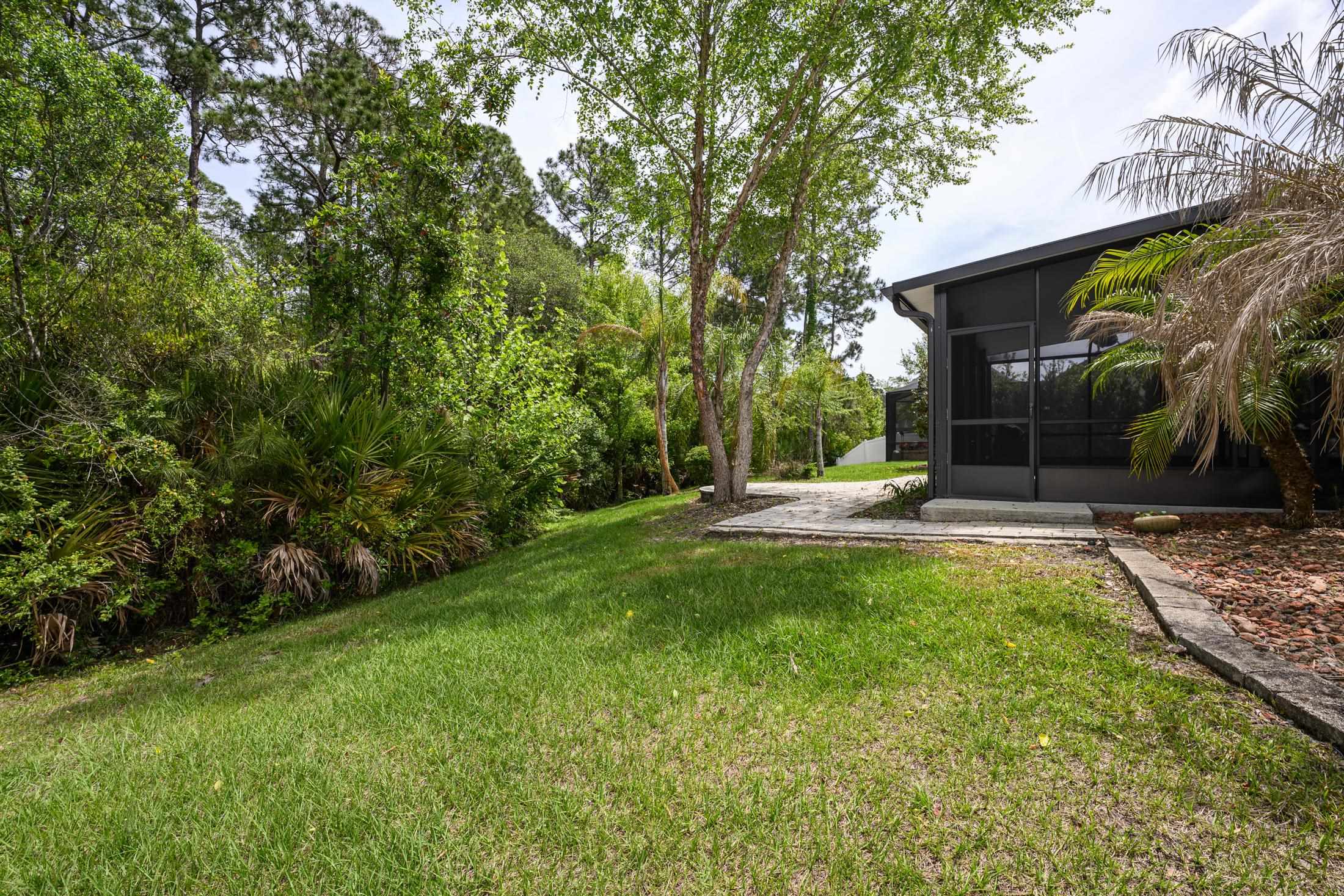 772 Pullman Circle St. Augustine, FL 32084 - Photo 58 of 77 a view of a house with backyard and sitting area