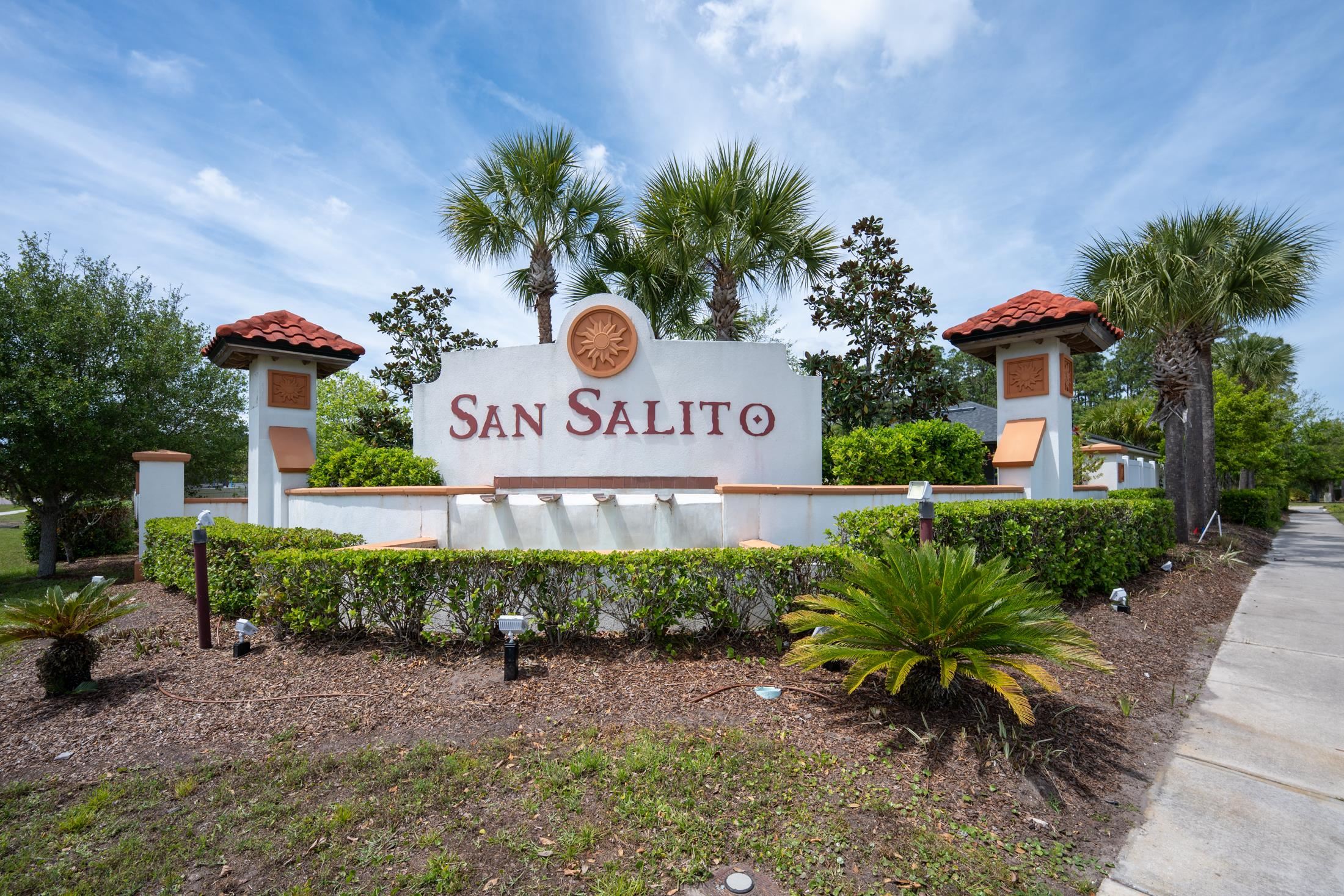 772 Pullman Circle St. Augustine, FL 32084 - Photo 66 of 77 a sign that is in front of flowers