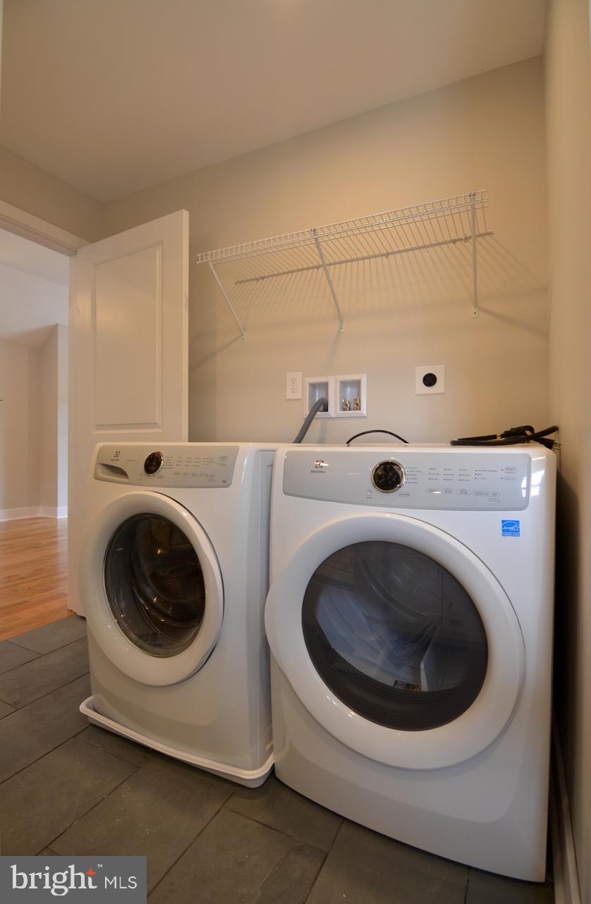 400 West Wayne Avenue, Unit 3 Wayne, PA 19087 - Photo 14 of 14 a utility room with dryer and washer