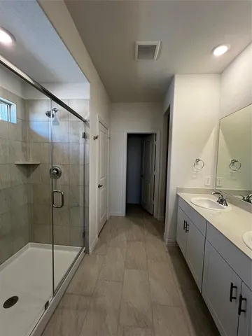 a bathroom with a sink a toilet and bathtub
