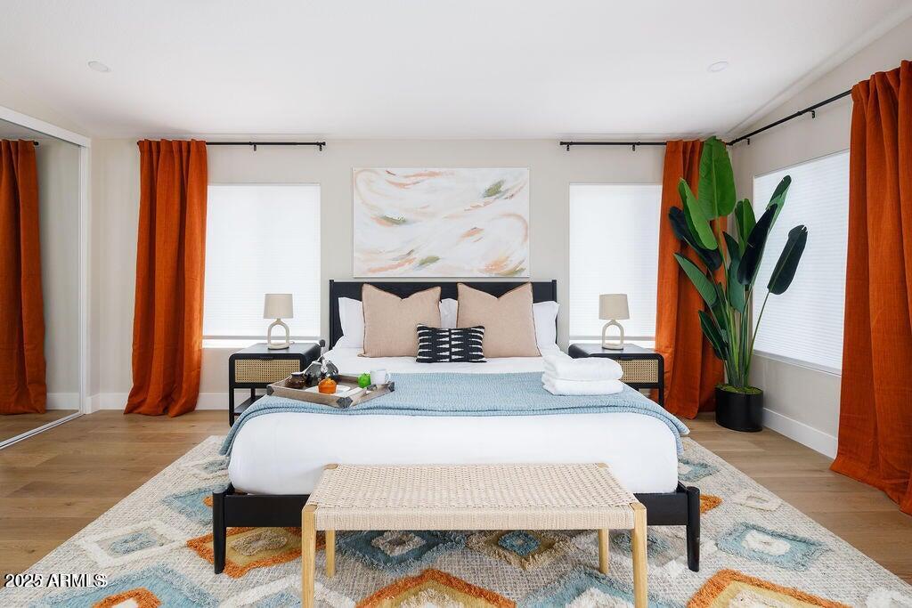 6174 East Janice Way Scottsdale, AZ 85254 - Photo 18 of 39 a bed sitting in a bedroom next to a window