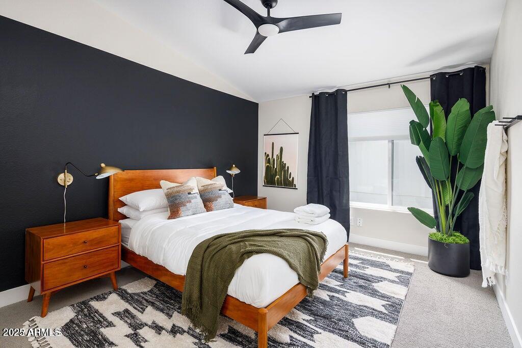 6174 East Janice Way Scottsdale, AZ 85254 - Photo 28 of 39 a bedroom with bed and a potted plant