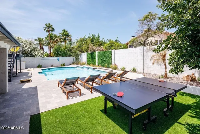 an outdoor space with furniture