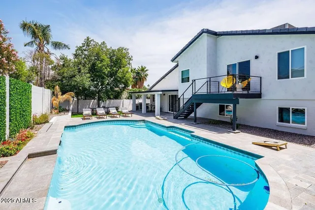 a view of a house with swimming pool