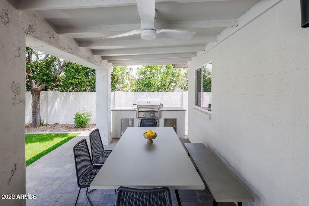 6174 East Janice Way Scottsdale, AZ 85254 - Photo 37 of 39 a view of a dining room with furniture window and outside view