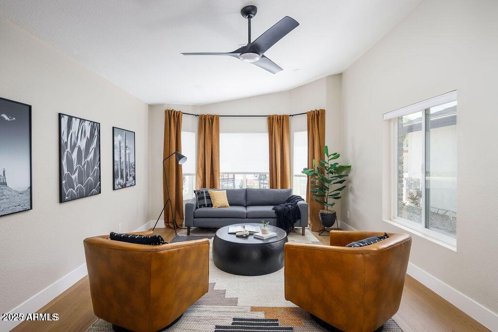 6174 East Janice Way Scottsdale, AZ 85254 - Photo 5 of 39 a living room with furniture and a large window
