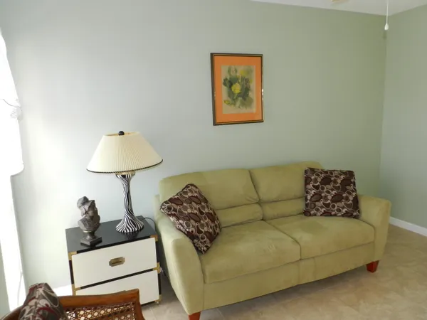 a living room with furniture and a couch
